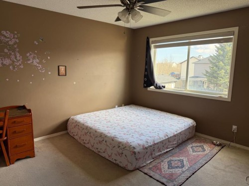 830 Martindale Boulevard Ne, Calgary, AB - Indoor Photo Showing Bedroom