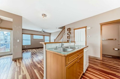 89 Hidden Ranch Hill Nw, Calgary, AB - Indoor Photo Showing Kitchen With Double Sink