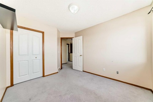 89 Hidden Ranch Hill Nw, Calgary, AB - Indoor Photo Showing Other Room