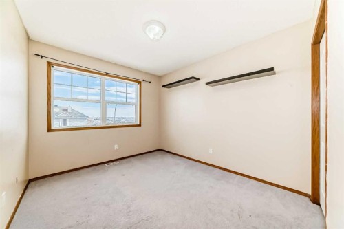 89 Hidden Ranch Hill Nw, Calgary, AB - Indoor Photo Showing Other Room