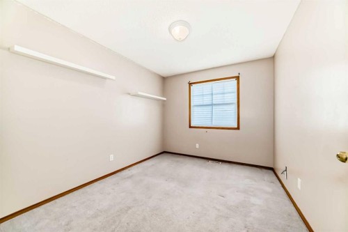 89 Hidden Ranch Hill Nw, Calgary, AB - Indoor Photo Showing Other Room