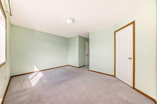 89 Hidden Ranch Hill Nw, Calgary, AB - Indoor Photo Showing Other Room