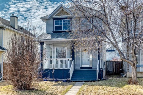 89 Hidden Ranch Hill Nw, Calgary, AB - Outdoor With Deck Patio Veranda