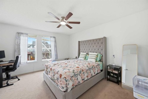 41 New Brighton Green Se, Calgary, AB - Indoor Photo Showing Bedroom