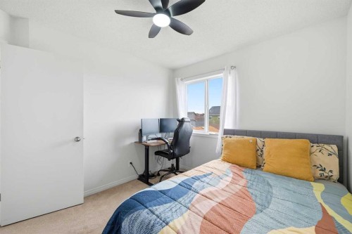 41 New Brighton Green Se, Calgary, AB - Indoor Photo Showing Bedroom