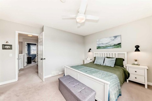 136 Hidden Hills Road Nw, Calgary, AB - Indoor Photo Showing Bedroom