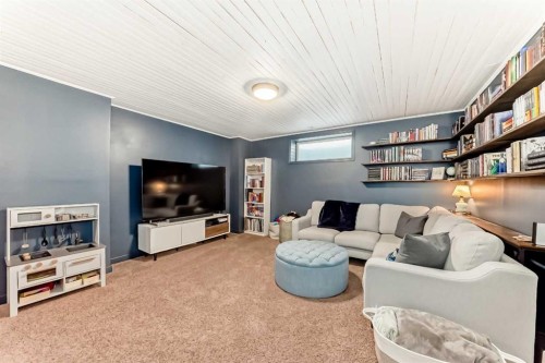 136 Hidden Hills Road Nw, Calgary, AB - Indoor Photo Showing Living Room