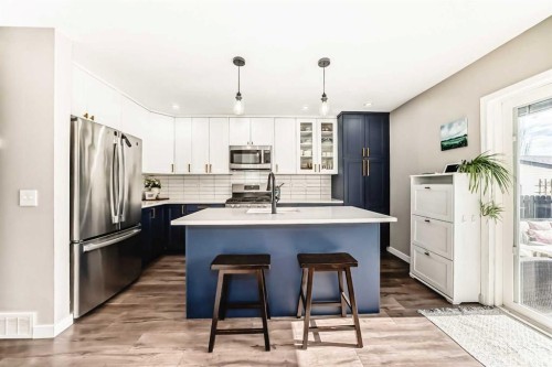 136 Hidden Hills Road Nw, Calgary, AB - Indoor Photo Showing Kitchen With Stainless Steel Kitchen With Upgraded Kitchen