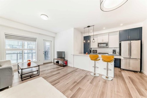 44 Spring Creek Common Sw, Calgary, AB - Indoor Photo Showing Kitchen With Stainless Steel Kitchen