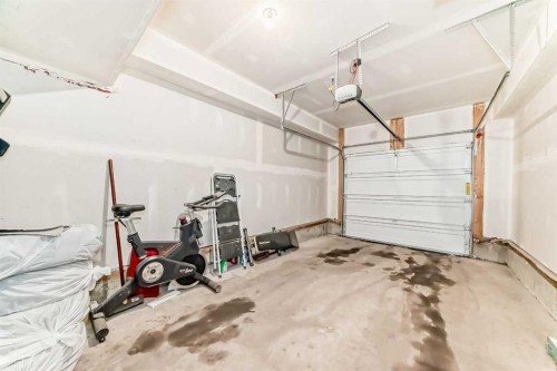 44 Spring Creek Common Sw, Calgary, AB - Indoor Photo Showing Garage