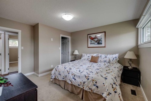 5207 Grove Hill Road Sw, Calgary, AB - Indoor Photo Showing Bedroom