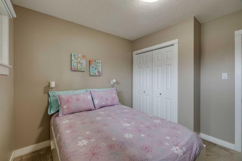 5207 Grove Hill Road Sw, Calgary, AB - Indoor Photo Showing Bedroom
