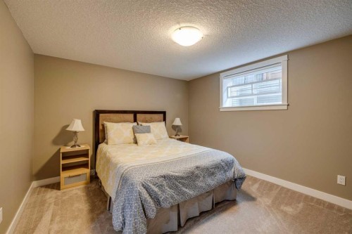 5207 Grove Hill Road Sw, Calgary, AB - Indoor Photo Showing Bedroom