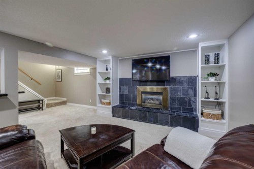 5207 Grove Hill Road Sw, Calgary, AB - Indoor With Fireplace