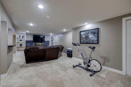 5207 Grove Hill Road Sw, Calgary, AB - Indoor Photo Showing Gym Room