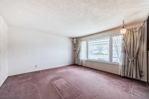165 Marbrooke Circle Ne, Calgary, AB - Indoor Photo Showing Other Room