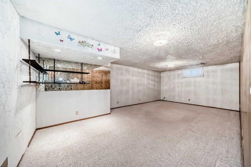 165 Marbrooke Circle Ne, Calgary, AB - Indoor Photo Showing Other Room
