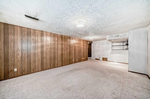 165 Marbrooke Circle Ne, Calgary, AB - Indoor Photo Showing Other Room