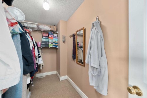66 Crystalridge Crescent, Okotoks, AB - Indoor With Storage