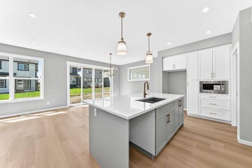 547 Mercado Avenue Se, Calgary, AB - Indoor Photo Showing Kitchen With Double Sink With Upgraded Kitchen