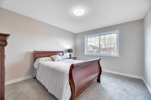223 Coventry Road Ne, Calgary, AB - Indoor Photo Showing Bedroom