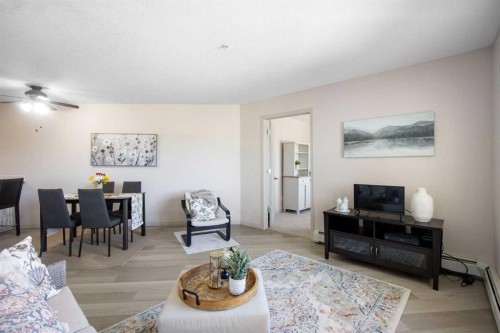 210-3 Parklane Way, Strathmore, AB - Indoor Photo Showing Living Room
