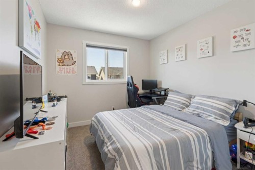 267 Sundown Road West, Cochrane, AB - Indoor Photo Showing Bedroom