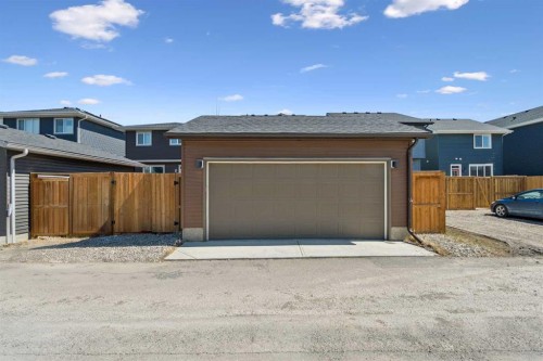 267 Sundown Road West, Cochrane, AB - Outdoor With Exterior