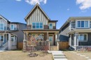 267 Sundown Road West, Cochrane, AB  - Outdoor With Deck Patio Veranda With Facade 