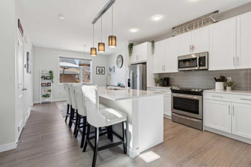 267 Sundown Road West, Cochrane, AB - Indoor Photo Showing Kitchen With Upgraded Kitchen