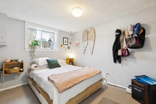 104 Cedarpark Drive Sw, Calgary, AB - Indoor Photo Showing Bedroom