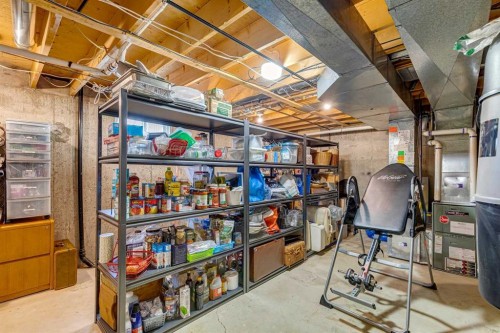 104 Cedarpark Drive Sw, Calgary, AB - Indoor Photo Showing Basement