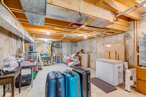 104 Cedarpark Drive Sw, Calgary, AB - Indoor Photo Showing Basement