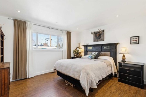 104 Cedarpark Drive Sw, Calgary, AB - Indoor Photo Showing Bedroom