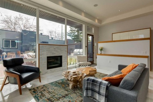 2210 Victoria Crescent Nw, Calgary, AB - Indoor Photo Showing Living Room With Fireplace