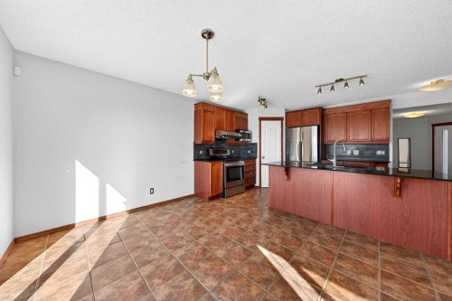 172 Kincora Drive Nw, Calgary, AB - Indoor Photo Showing Kitchen With Stainless Steel Kitchen