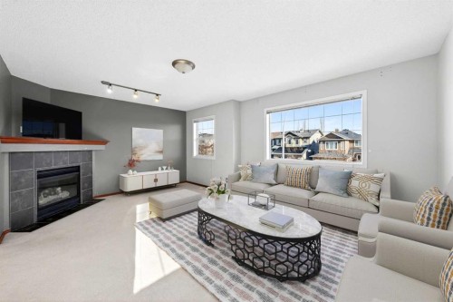172 Kincora Drive Nw, Calgary, AB - Indoor Photo Showing Living Room With Fireplace