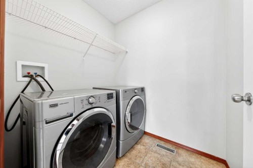 172 Kincora Drive Nw, Calgary, AB - Indoor Photo Showing Laundry Room
