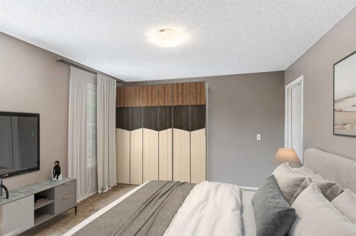 14 Elgin Meadows Way Se, Calgary, AB - Indoor Photo Showing Bedroom