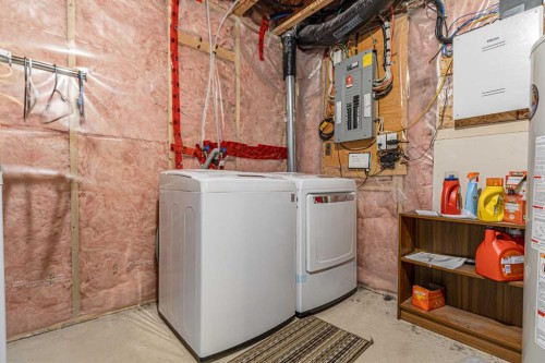 14 Elgin Meadows Way Se, Calgary, AB - Indoor Photo Showing Laundry Room