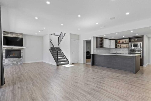 112 Cranbrook View Se, Calgary, AB - Indoor With Fireplace