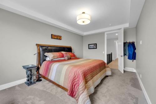 192 Magnolia Manor Se, Calgary, AB - Indoor Photo Showing Bedroom