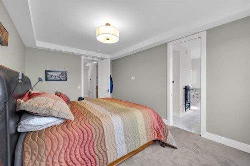 192 Magnolia Manor Se, Calgary, AB - Indoor Photo Showing Bedroom