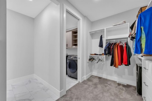 192 Magnolia Manor Se, Calgary, AB - Indoor Photo Showing Laundry Room