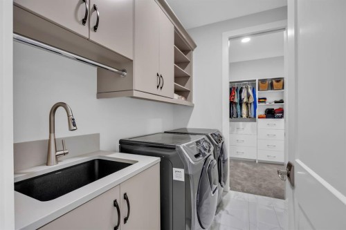 192 Magnolia Manor Se, Calgary, AB - Indoor Photo Showing Laundry Room