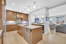192 Magnolia Manor Se, Calgary, AB  - Indoor Photo Showing Kitchen With Upgraded Kitchen 