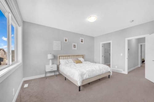 155 Carringham Way Nw, Calgary, AB - Indoor Photo Showing Bedroom