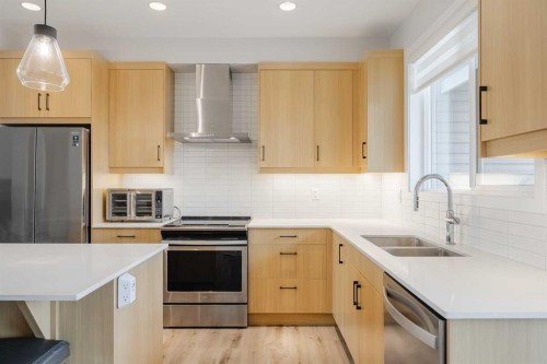 59 Walgrove Plaza Se, Calgary, AB - Indoor Photo Showing Kitchen With Stainless Steel Kitchen With Double Sink With Upgraded Kitchen