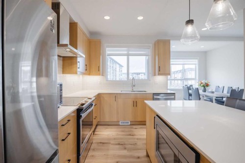 59 Walgrove Plaza Se, Calgary, AB - Indoor Photo Showing Kitchen With Upgraded Kitchen