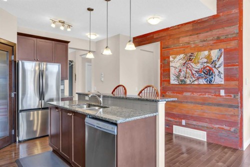 1 Westridge Way, Okotoks, AB - Indoor Photo Showing Kitchen With Double Sink With Upgraded Kitchen